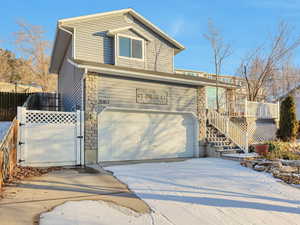 View of front of property with a garage