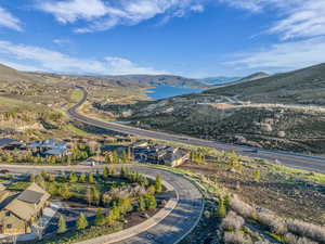 Aerial perspective of suburban area with a mountain backdrop