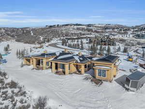 Snowy aerial view with a mountain view