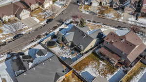 Aerial view of home and corner lot