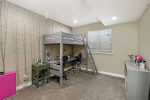 Bedroom with carpet flooring