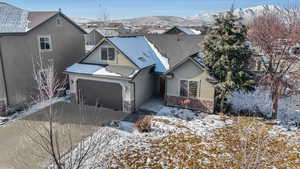 View of front of property with a mountain view