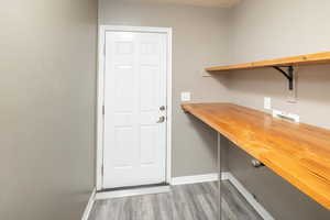 Washroom featuring wood-type flooring