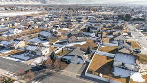 Snowy aerial view with a mountain view