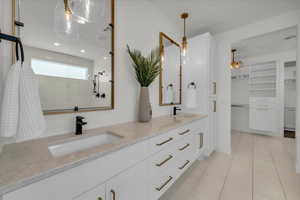 Bathroom with vanity and tile patterned floors