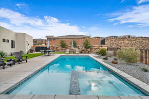 View of pool featuring a patio