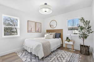 Bedroom featuring wood-type flooring