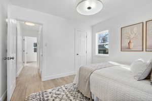 Bedroom with light wood-type flooring