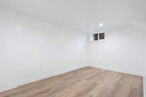 Unfurnished room with light wood-type flooring