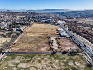 Birds eye view of property with a mountain view