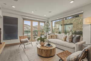 Sunroom / solarium with a mountain view