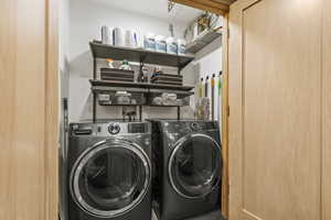 Washroom featuring separate washer and dryer