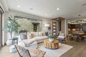 Living room with light wood-type flooring