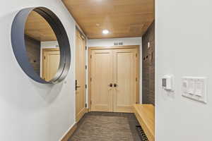 Interior space featuring wooden ceiling