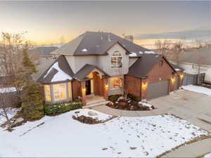 View of front of property with a garage