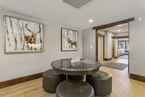 Dining room with wood-type flooring