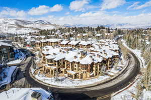 Snowy aerial view with a mountain view