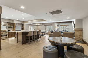 Dining space featuring light hardwood / wood-style flooring