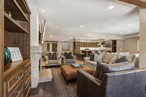 Living room with a stone fireplace