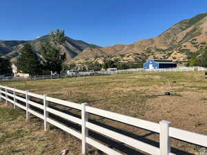 View of mountain feature with a rural view