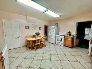 Kitchen with white appliances