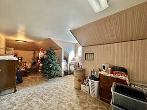 Bonus room featuring carpet flooring