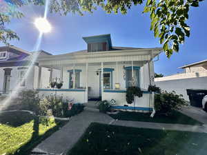 View of front of house with covered porch