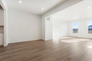 Unfurnished room with light hardwood / wood-style flooring