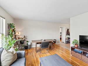 Living room with hardwood / wood-style floors