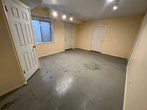 Interior space featuring concrete flooring