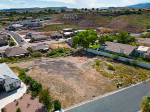 Birds eye view of property with a mountain view