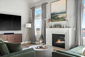 Living room with light wood-type flooring