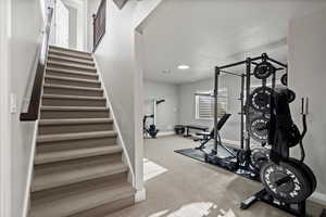 Workout room featuring carpet floors