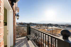 Balcony off of master bedroom featuring a mountain view