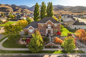 Aerial view of residential area with a mountainous background