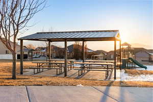 View of home's community featuring a playground