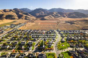 Aerial perspective of suburban area featuring mountains