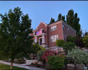 View of front facade featuring a balcony