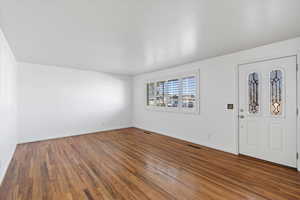 Entryway featuring hardwood / wood-style floors