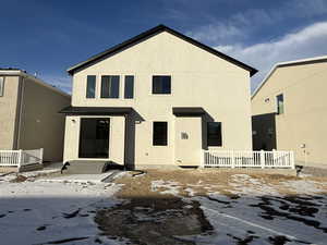 View of snow covered property