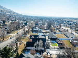 Birds eye view of property with a mountain view