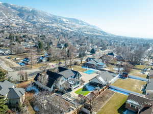 Birds eye view of property featuring a mountain view