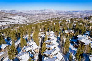 Snowy aerial view with a mountain view