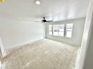 Owner's bedroom with carpeted flooring.