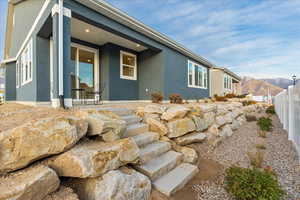 View of home's exterior with a mountain view