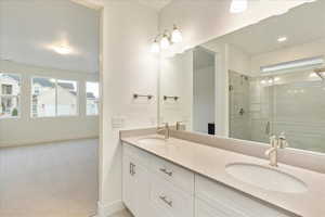 Primary bathroom with quartz counter tops