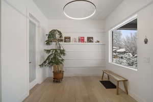 Hall featuring light hardwood / wood-style floors