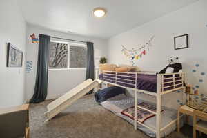 View of carpeted bedroom