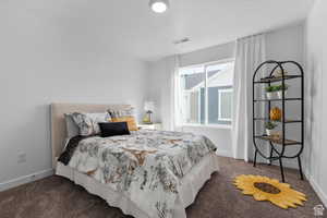 View of carpeted bedroom