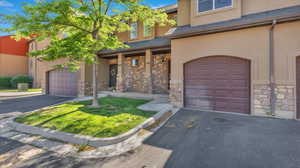 View of front of property with a garage